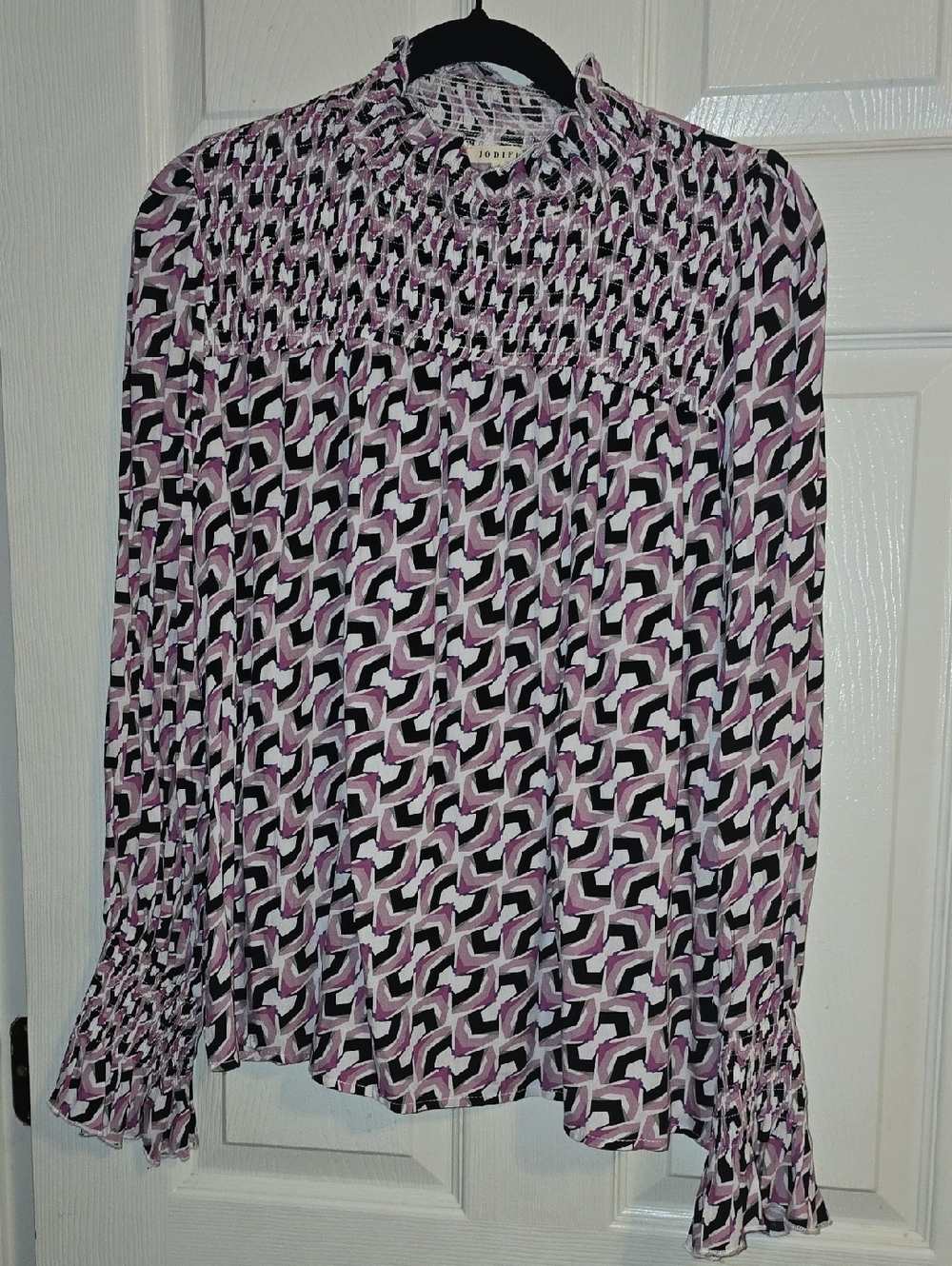 JODIFL Black White Pink Geometric Smocked-Neck Blouse